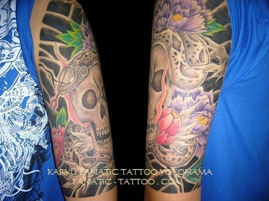 Classic Snake With Skull And Flowers Tattoo On Half Sleeve