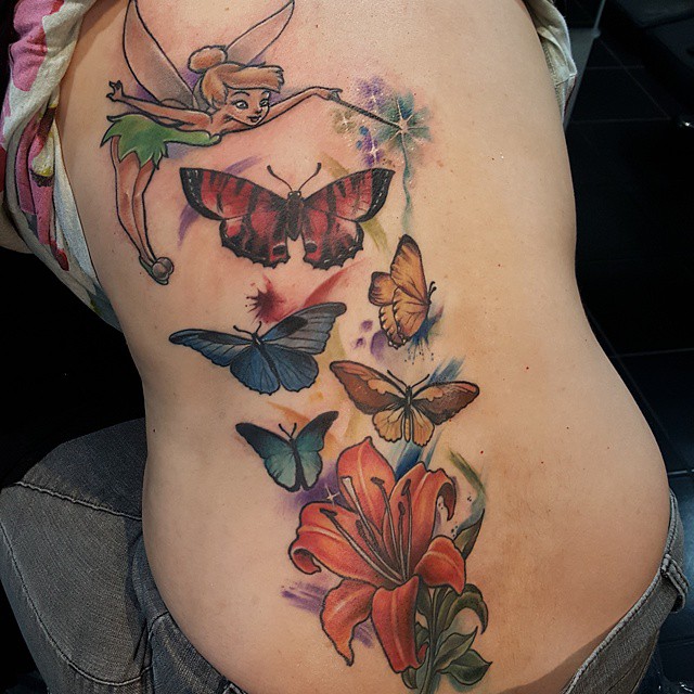 Color Butterflies And Lily Flowers Tattoo On Side Rib