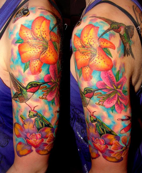 Colored Hummingbird And Lily Tattoo On Half Sleeve