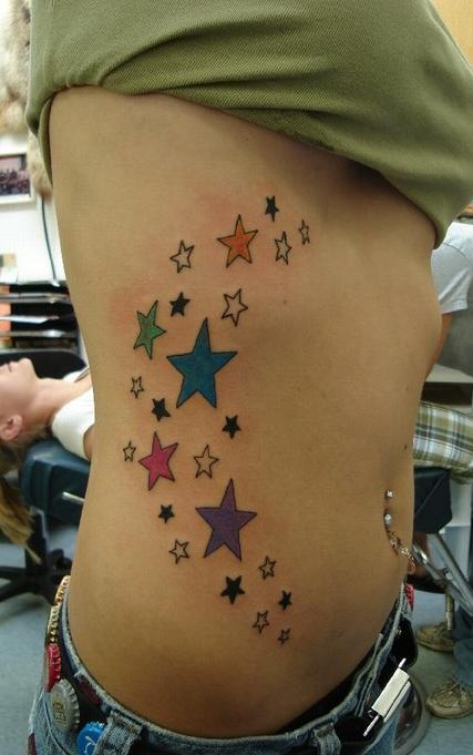 Colored Star Tattoos On Girl Stomach