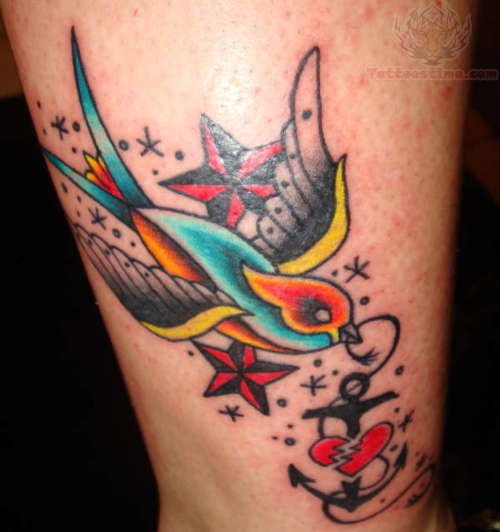 Colored Swallow And Nautical Star Tattoo On Leg