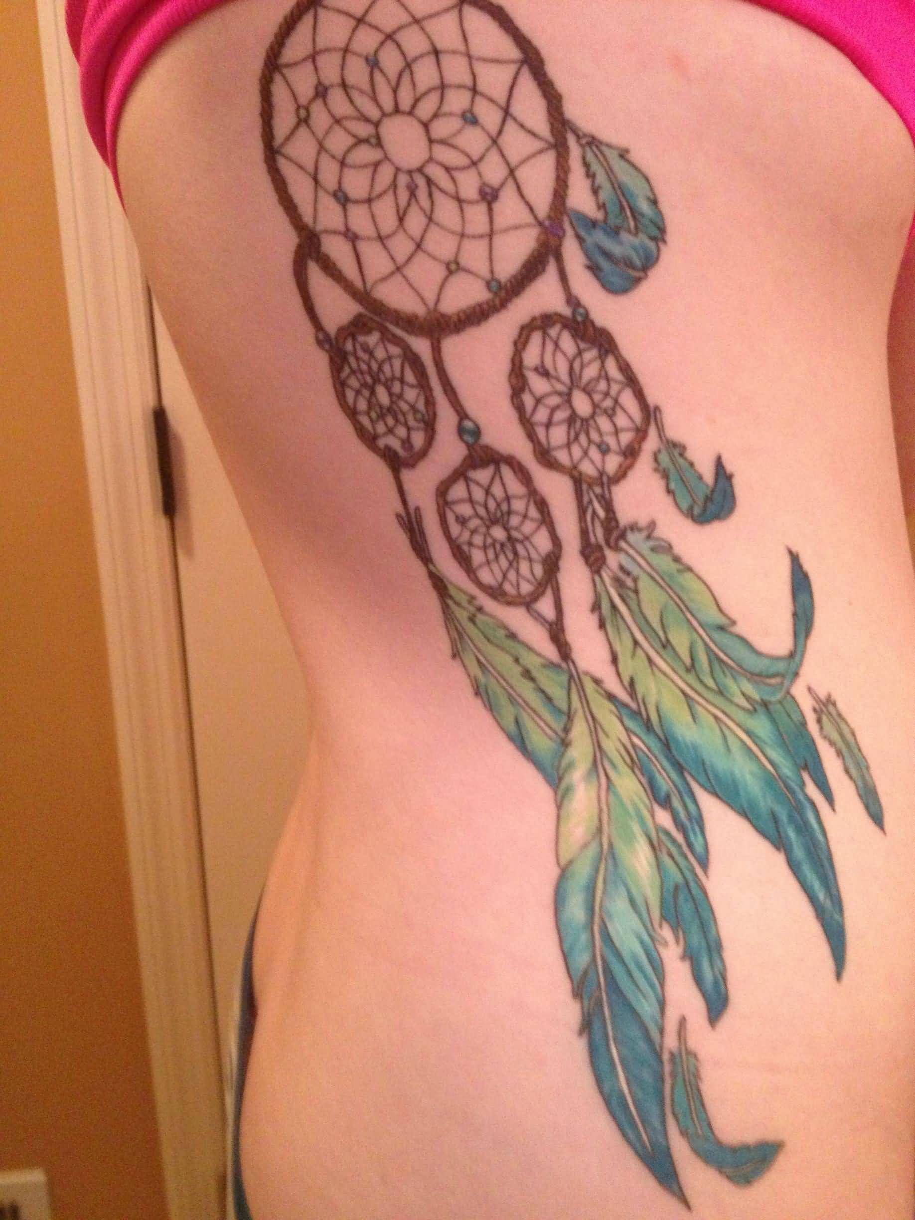 Colorful Dreamcatcher Tattoo On Girl Rib Side