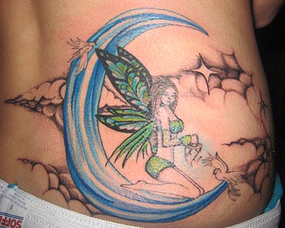 Colorful Fairy On Half Moon Tattoo On Lower Back By Amy