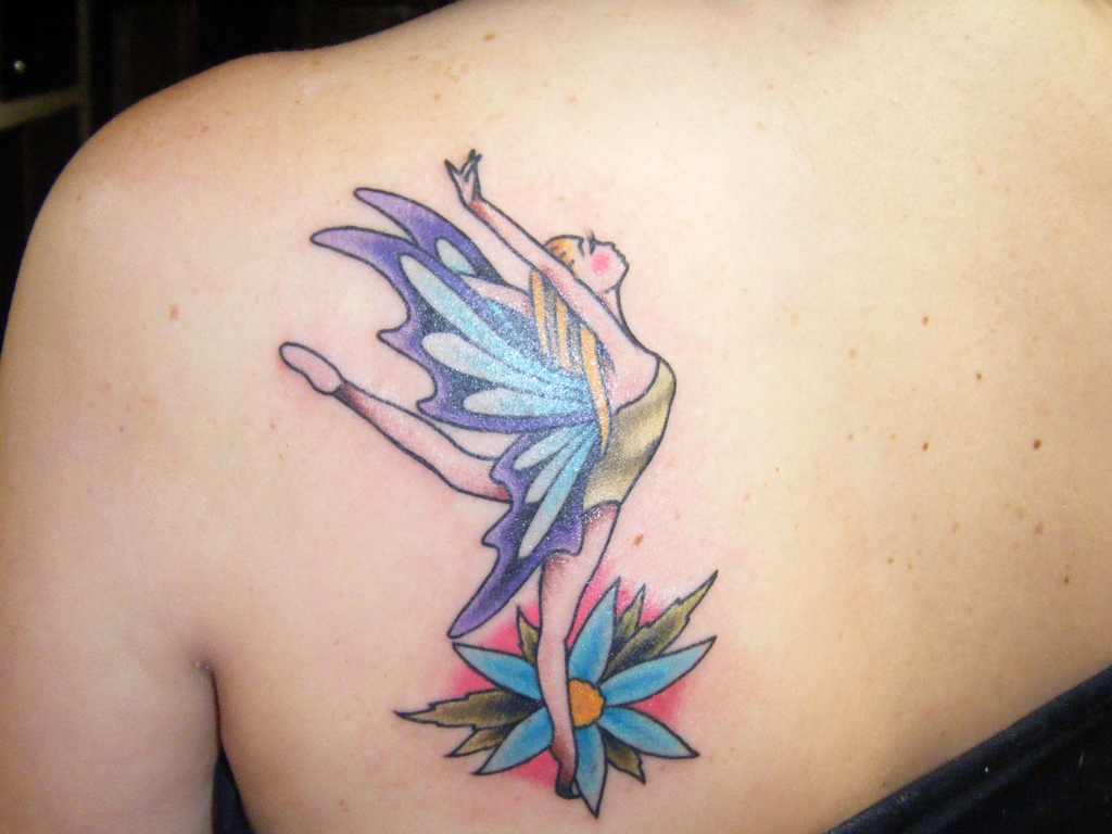 Colorful Fairy With Flower Tattoo On Left Back Shoulder