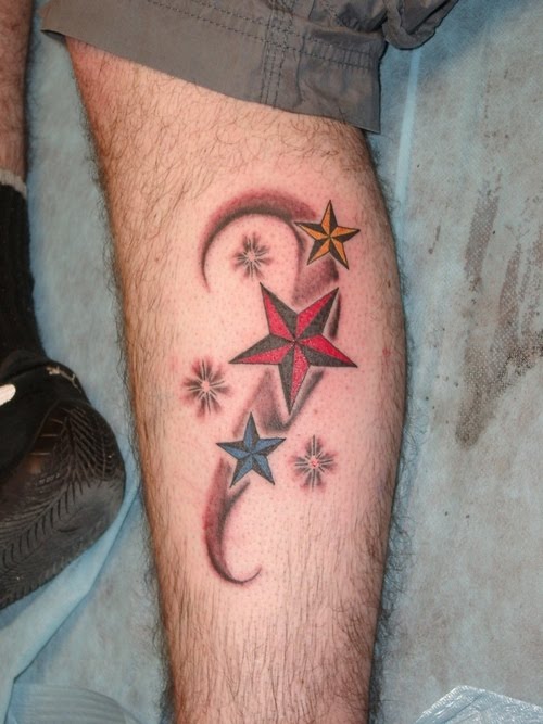 Colorful Nautical Star Tattoo On Side Leg