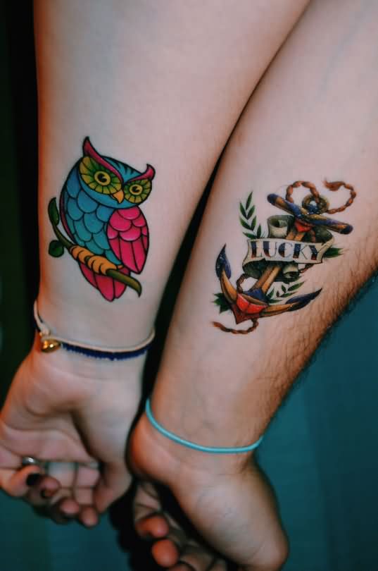 Colorful Owl And Anchor With Banner Tattoo On Couple Wrist