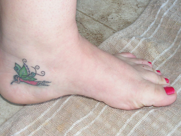 Colorful Small Fairy Tattoo On Right Ankle