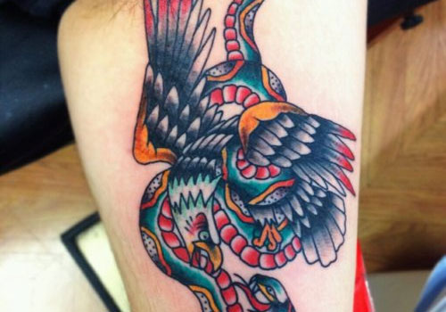 Colorful Traditional Eagle With Snake Design For Thigh