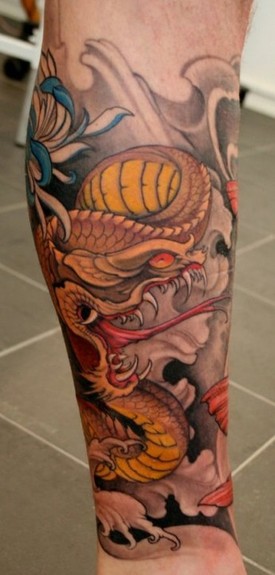 Colorful Traditional Snake Tattoo On Forearm