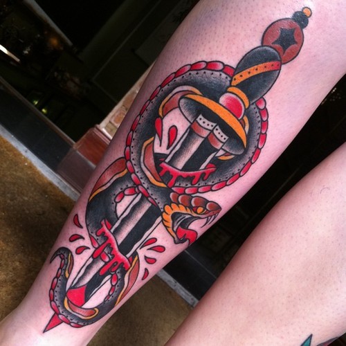 Colorful Traditional Snake With Dagger Tattoo On Leg By Jelle Soos Nelemans
