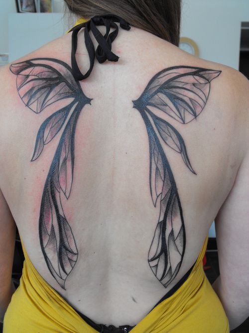 Cool Black Ink Fairy Wings Tattoo On Girl Back