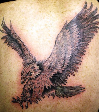 Cool Black Ink Flying Eagle Tattoo Design For Upper Back