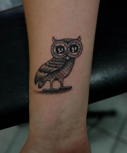 Cool Black Ink Owl Tattoo Design For Wrist