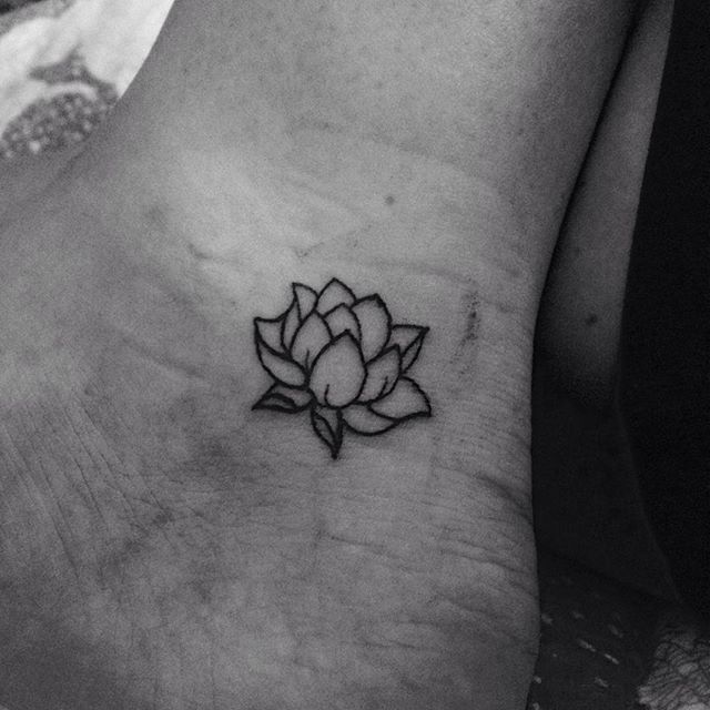 Cool Black Outline Lotus Flower Tattoo On Left Ankle