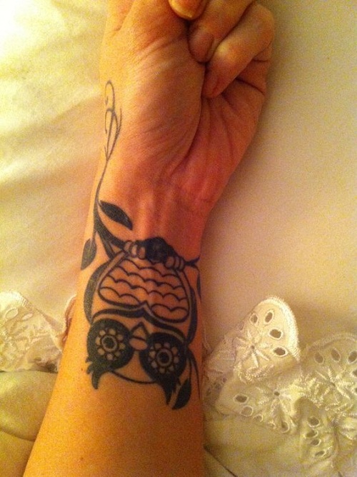 Cool Black Owl Tattoo On Left Wrist