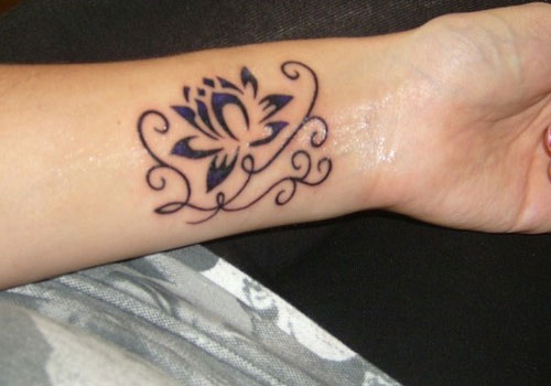 Cool Black Tribal Lotus Flower Tattoo On Left Wrist