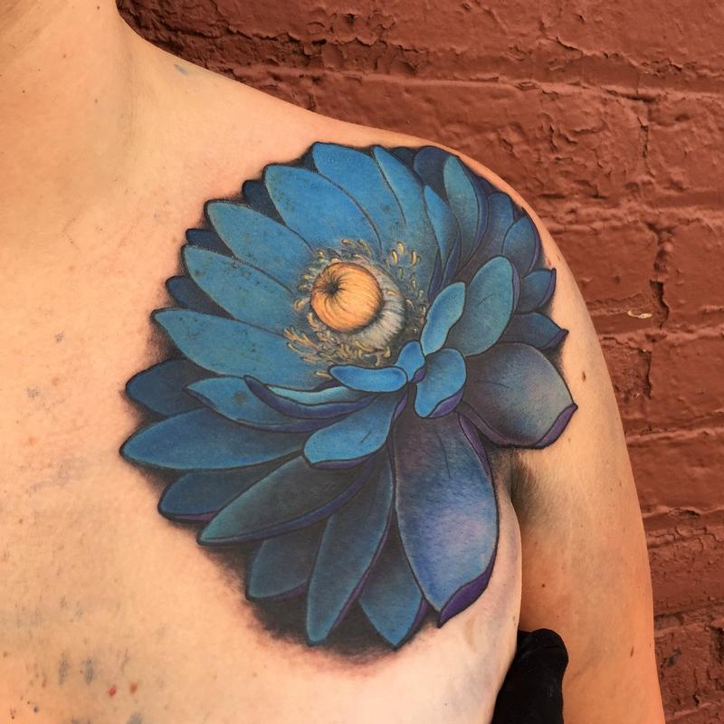 Cool Blue Ink Lily Cover Up Tattoo On Man Left Front Shoulder