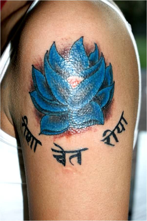 Cool Blue Ink Lotus Tattoo On Man Left Shoulder