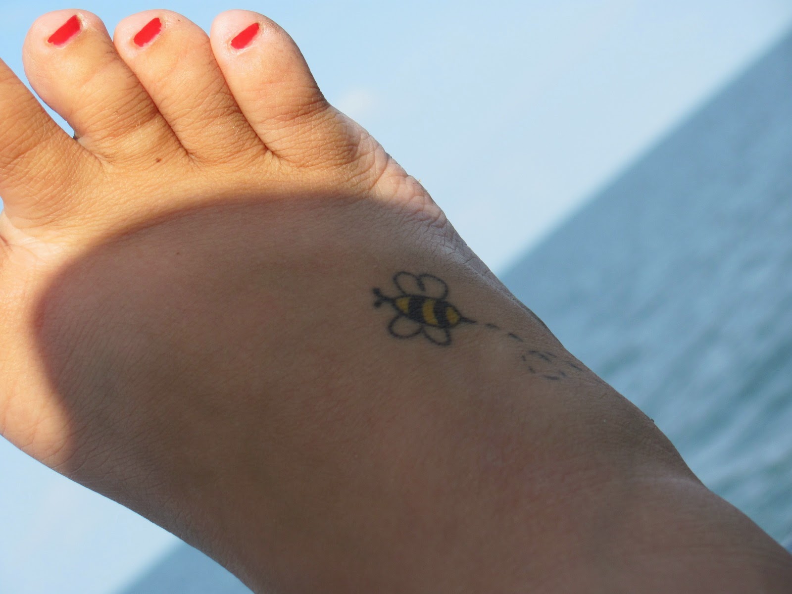 Cool Bumblebee Tattoo On Girl Right Foot