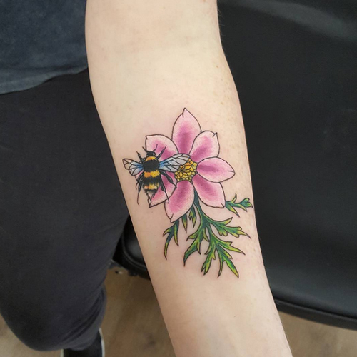 Cool Bumblebee With Flower Tattoo On Forearm