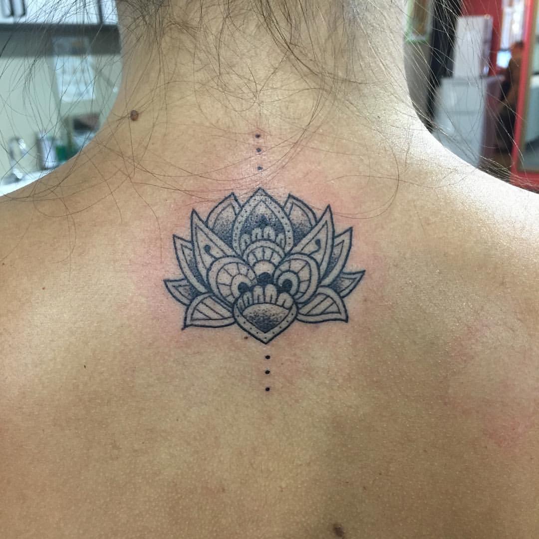 Cool Dotwork Mandala Flower Tattoo On Girl Back Neck