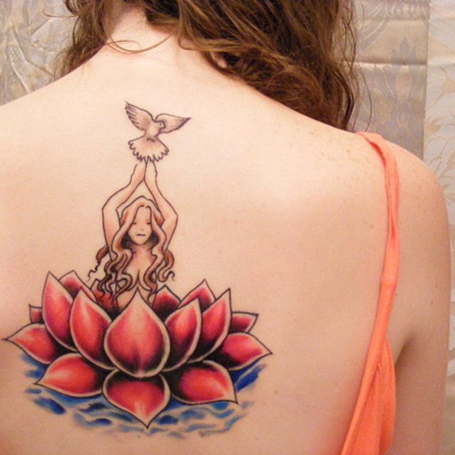 Cool Fairy On Lotus Flower Tattoo On Girl Upper Back