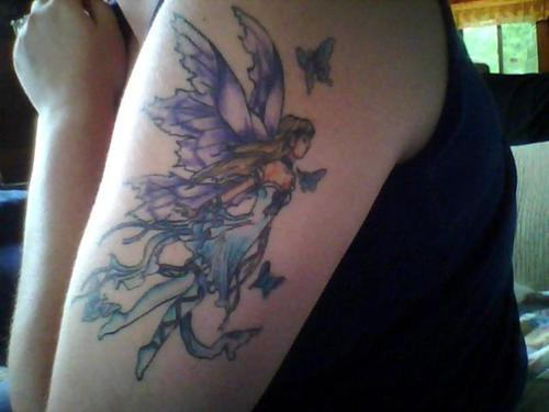 Cool Fairy With Flying Butterfly Tattoo On Left Upper Arm