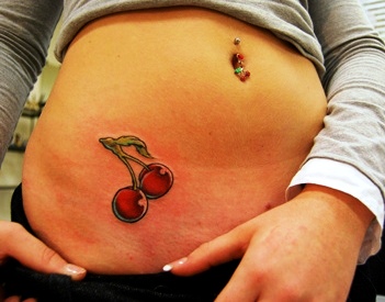Cool Girl With Cherry Tattoo On Right Hip