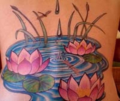 Cool Lotus Flowers In Water Tattoo Design For Back