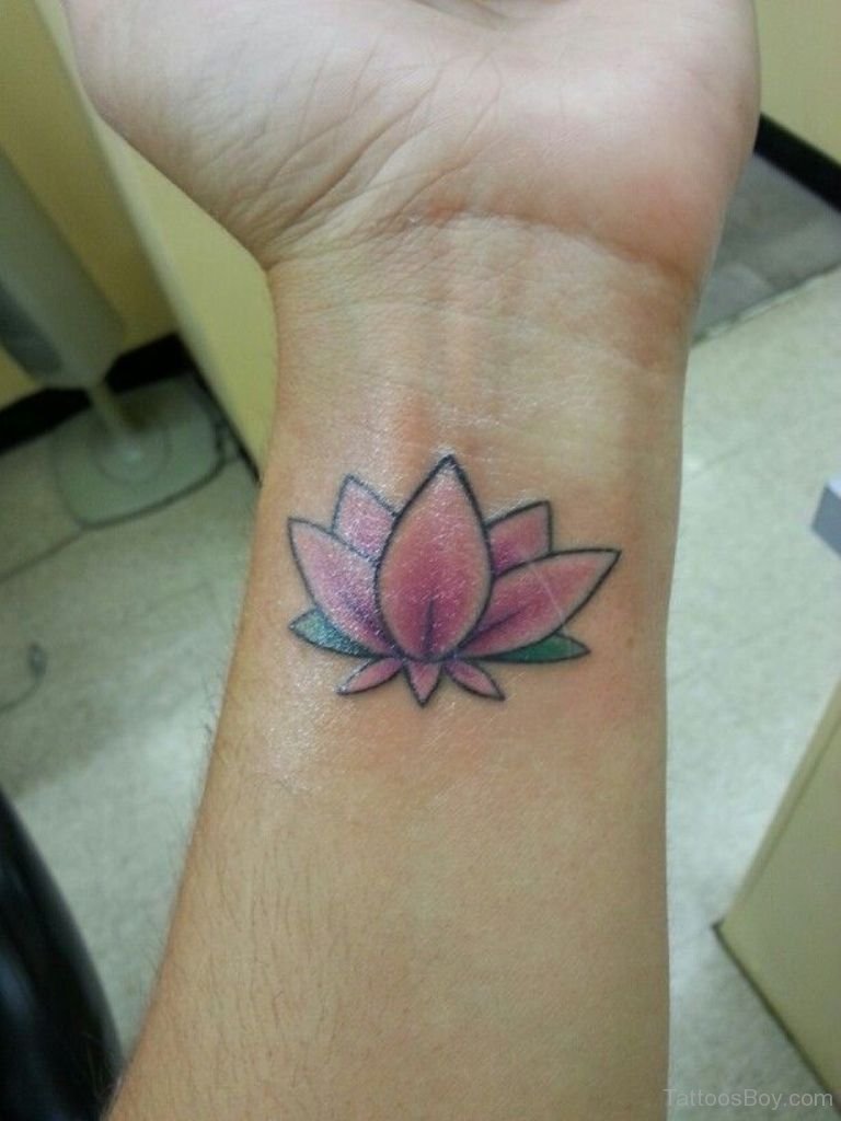 Cool Pink Ink Lotus Flower Tattoo On Left Wrist