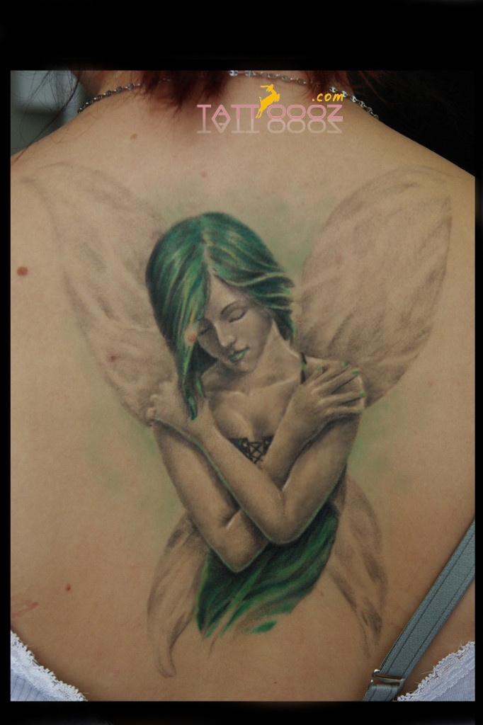 Cool Realistic Fairy Tattoo On Women Upper Back