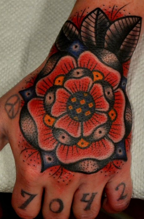 Cool Traditional Lotus Flower Tattoo On Left Hand