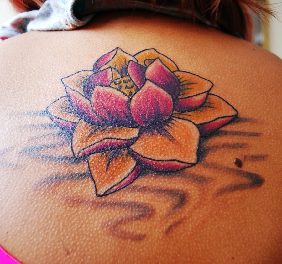 Cool Traditional Lotus Flower Tattoo On Upper Back