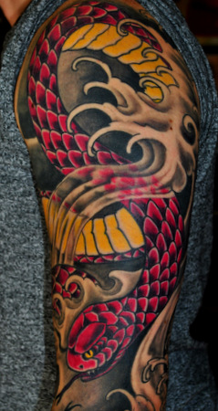 Cool Traditional Snake Tattoo On Left Half Sleeve