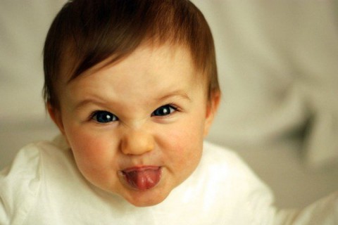 Cute Baby Girl Showing Tongue Funny Photo