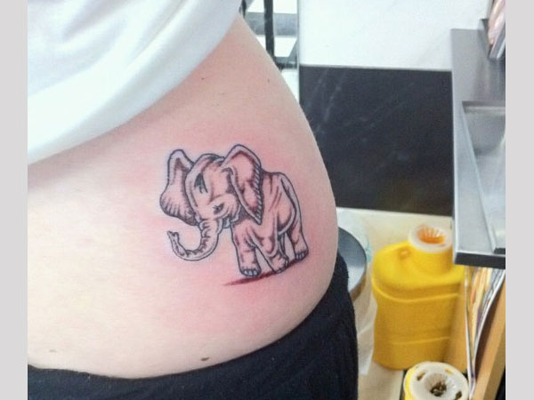 Cute Black Ink Elephant Baby Tattoo On Right Side Rib