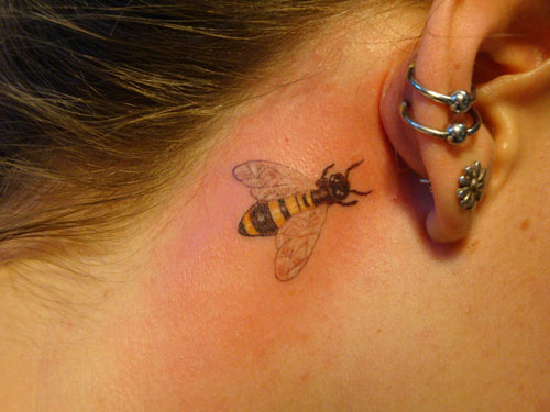 Cute Bumblebee Tattoo On Girl Right Behind The Ear By Miss Jenn