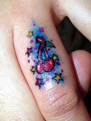 Cute Color Stars And Cherry Tattoo On Finger