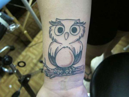 Cute Grey Ink Owl On Branch Tattoo On Right Wrist