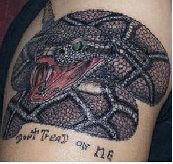 Dont Tread On Me -  Black Ink Rattlesnake Tattoo Design For Shoulder