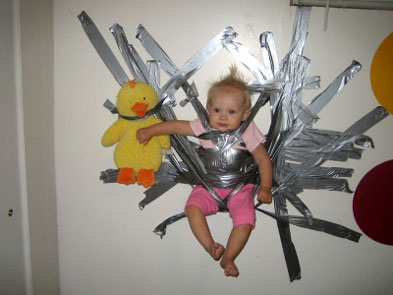 Duck Taped Kid On Wall Picture