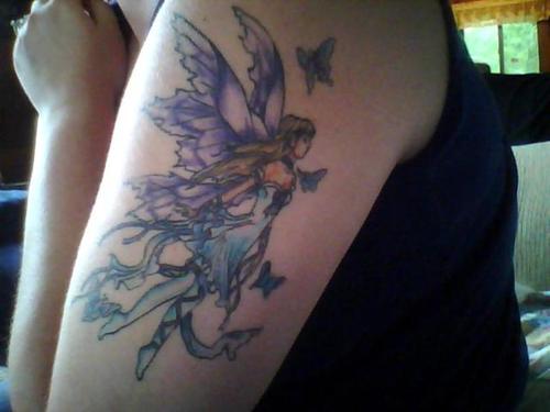 Fairy With Flying Butterflies Tattoo On Left Half Sleeve