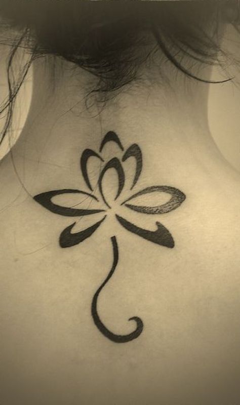 Fantastic Black Ink Lotus Flower Tattoo On Back Neck