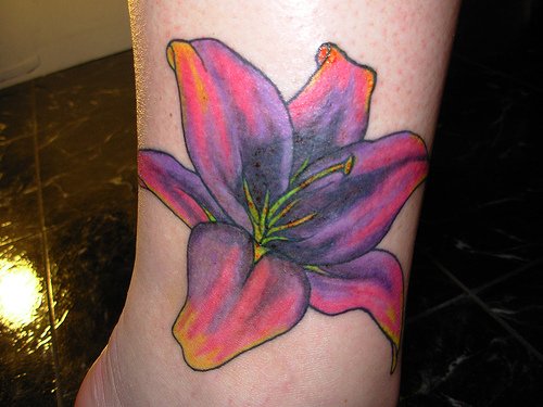 Fantastic Color Lily Tattoo On Ankle