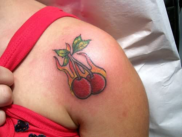 Flaming Cute Cherry Tattoo On Left Shoulder