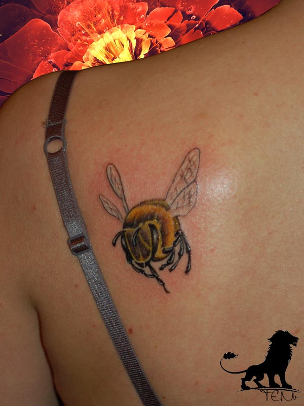 Flying Bumblebee Tattoo On Women Left Back Shoulder