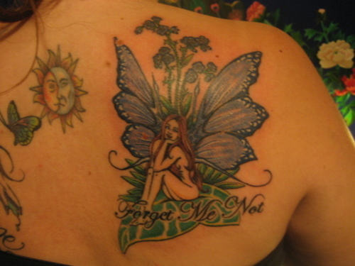 Forget Me Not – Awesome Fairy Tattoo On Right Back Shoulder