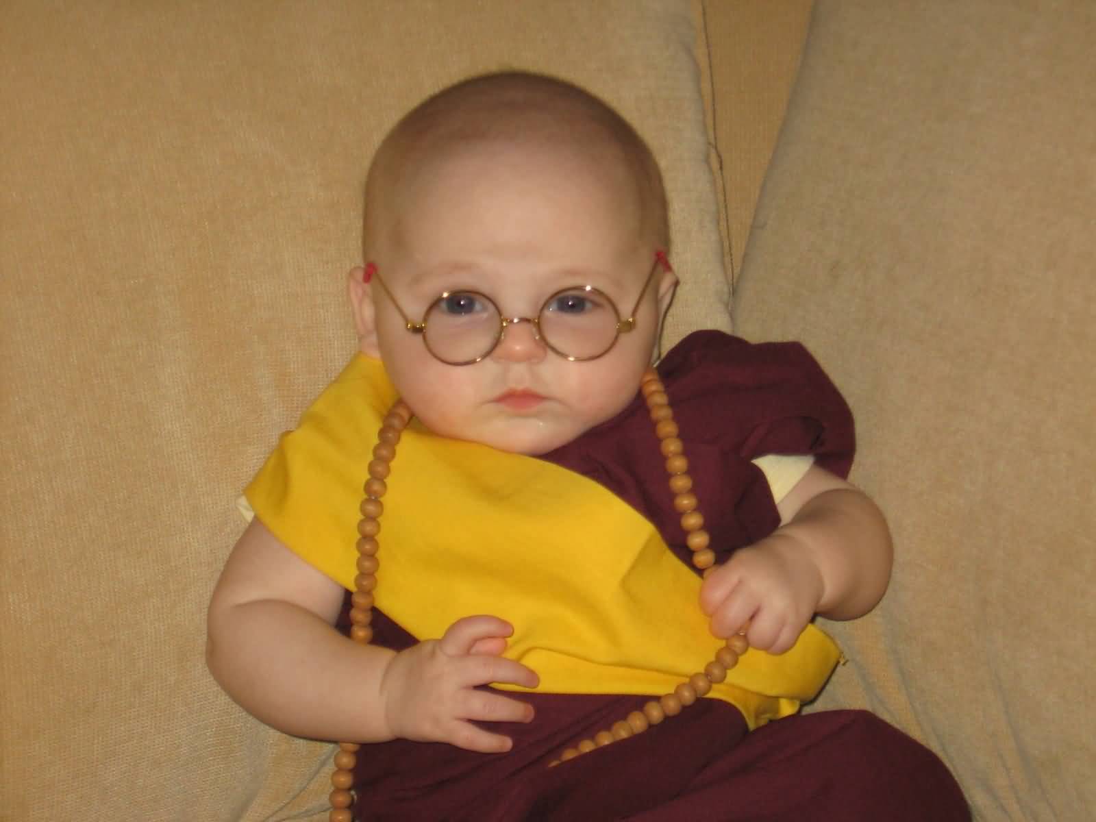 Funny Baby In Dalai Lama Costume