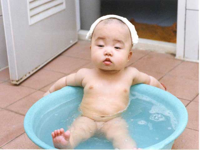 Funny Baby Sleeping In Bath Tub
