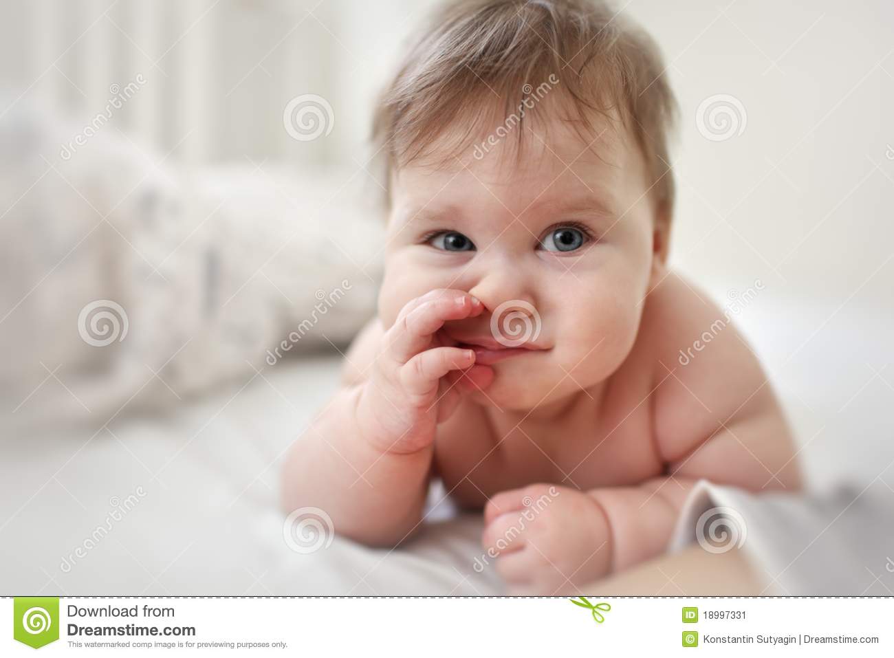 Funny Baby With Finger In Nose
